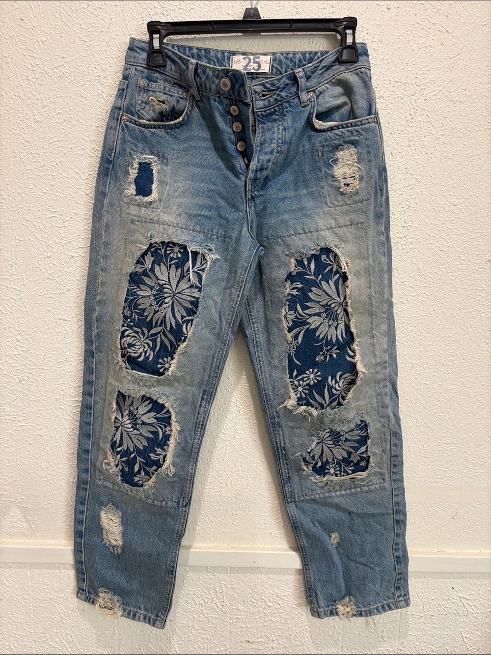 We The Free Light Blue Distressed Straight Leg Jeans with Navy Floral Patches
